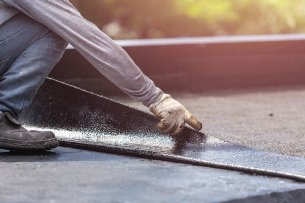 Professional Basement Waterproofing technician working in Ashburn, VA
